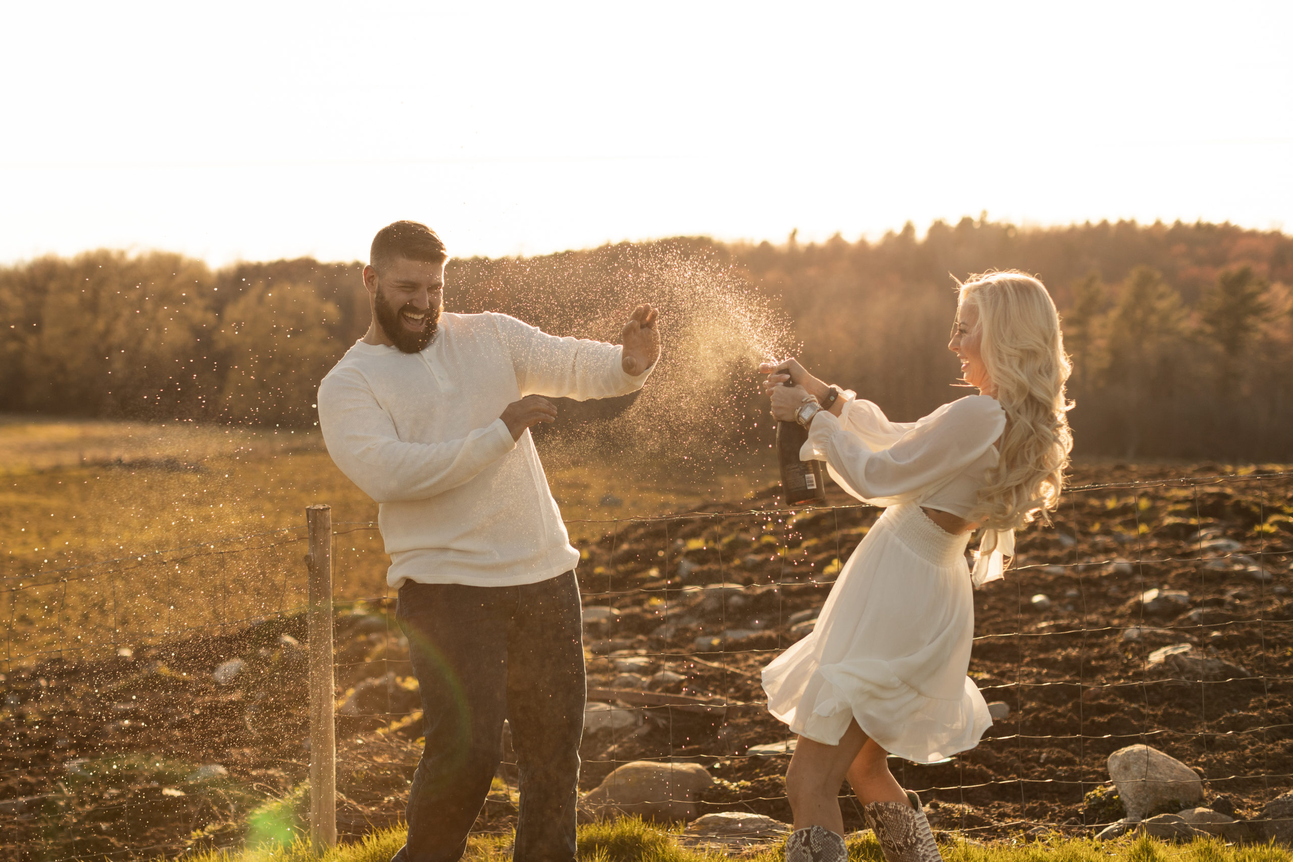 Fun Engagement Session Champagne Spray